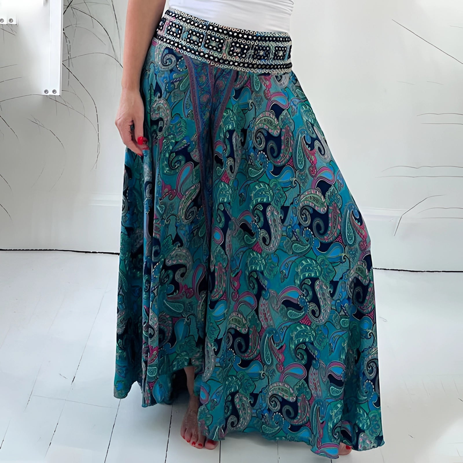 Bohemian Palazzo Pants in pink paisley print, featuring a wide-leg design and lightweight fabric.