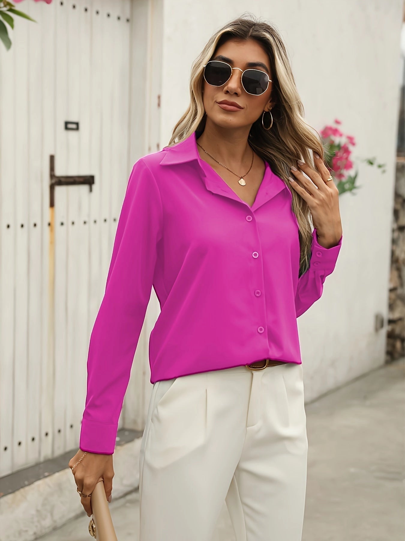 A woman wearing a crimson silk satin blouse, luxury red long sleeve shirt, rose red color in XXL(46) size, standing against a neutral background.