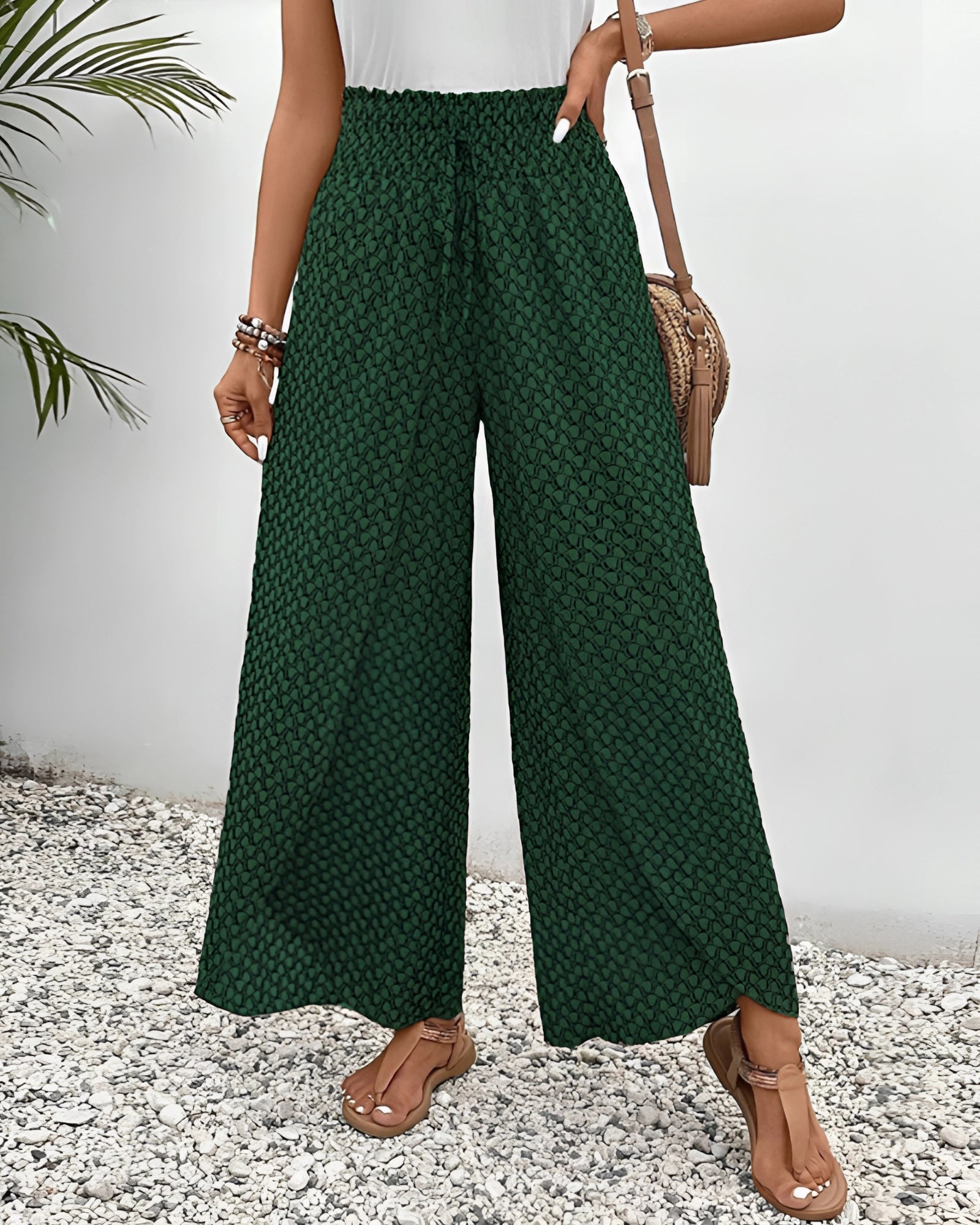 Green high-waisted palazzo pants with red ethnic pattern, suitable for summer boho beachwear, in 3XL size.