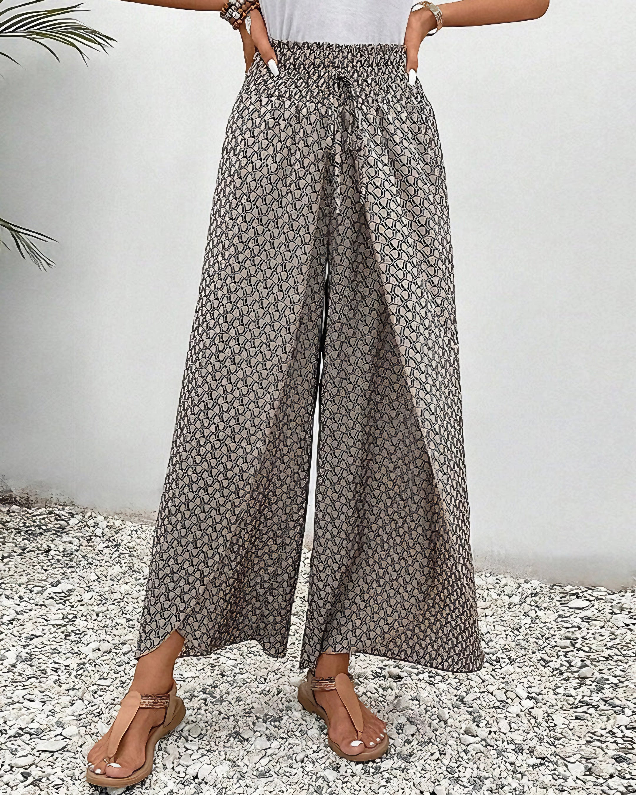 Red Ethnic Pattern High-Waisted Palazzo Pants with summer boho beachwear style, featuring vibrant patterns and a relaxed fit.